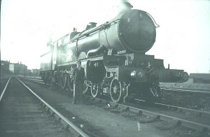 Someone poses alongside a GW Castle at the stations southerly approaches.