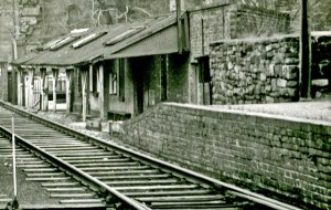 The ramshackle station building from the Colonel stephens Era, showing the ramp up to the platform.